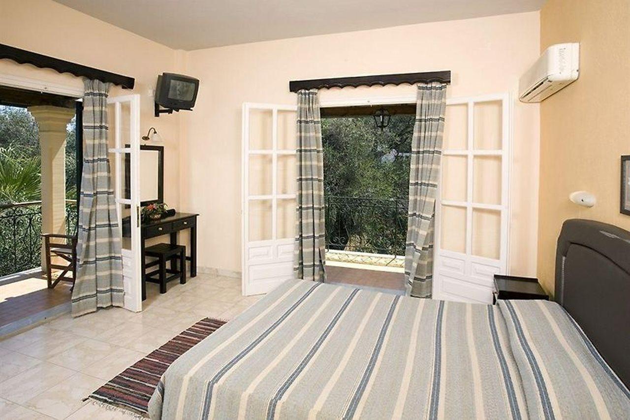 Yannis Servos Barbati Apartments Bagian luar foto